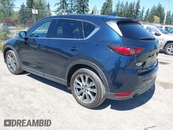 2019 Mazda CX-5 Signature with VIN JM3KFBEY7K0589236, listed as a IAAI auction lot 42078418 with 86,959 mi miles. Bid and sale history available at carsss.com. Image 3.