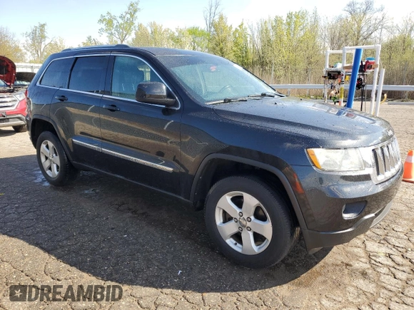 2012 Jeep Grand Cherokee Laredo with VIN 1C4RJFAG4CC203267, listed as a Copart auction lot 54910285 with 143,289 mi miles and Clean Title. Bid and sale history available at carsss.com. Image 4.