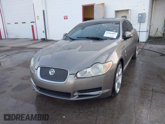 2009 Jaguar XF with VIN SAJWA07C991R01450, listed as a IAAI auction lot 41896882 with 163,857 mi miles and . Bid and sale history available at DreamBid. Image 6.