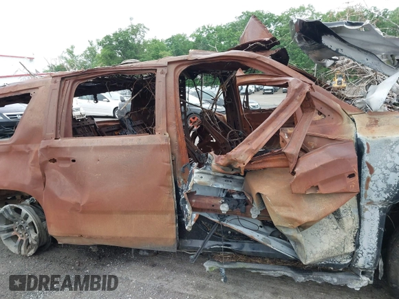 2017 Chevrolet Suburban LT with VIN 1GNSKHKC5HR235341, listed as a IAAI auction lot 42219754 with Not Provided miles and . Bid and sale history available at DreamBid. Image 12.