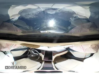 2017 Tesla Model S 100D with VIN 5YJSA1E28HF217489, listed as a IAAI auction lot 42128388 with Not provided miles and . Bid and sale history available at DreamBid. Image 19.