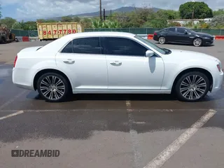 2012 Chrysler 300 S z VIN 2C3CCABG5CH115766, wystawiony jako IAAI lot #41893708 z przebiegiem 129 260 mil mil oraz . Historia ofert i sprzedaży dostępna na DreamBid. Obrazek 13.