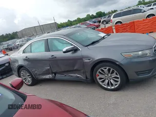 2014 Ford Taurus Limited with VIN 1FAHP2F81EG123902, listed as a IAAI auction lot 42345275 with 152,673 mi miles and . Bid and sale history available at DreamBid. Image 13.