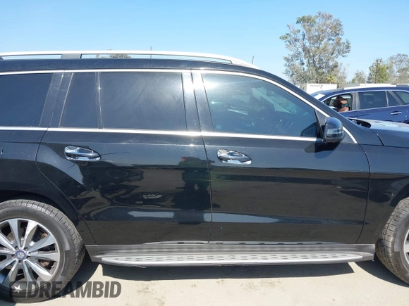 2014 Mercedes-Benz GL 450 with VIN 4JGDF7CE7EA414390, listed as a IAAI auction lot 42554915 with 114,997 mi miles and . Bid and sale history available at DreamBid. Image 13.