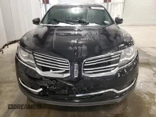 2016 Lincoln MKX Reserve with VIN 2LMTJ8LR2GBL76128, listed as a Copart auction lot 44563065 with 128,934 mi miles and Salvage Title. Bid and sale history available at carsss.com. Image 5.