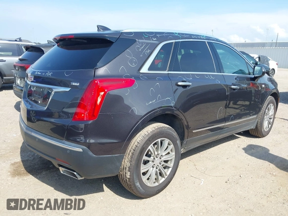 2018 Cadillac XT5 Luxury AWD z VIN 1GYKNDRS0JZ209266, wystawiony jako IAAI lot #42454536 z przebiegiem 52 839 mil mil oraz . Historia ofert i sprzedaży dostępna na DreamBid. Obrazek 4.