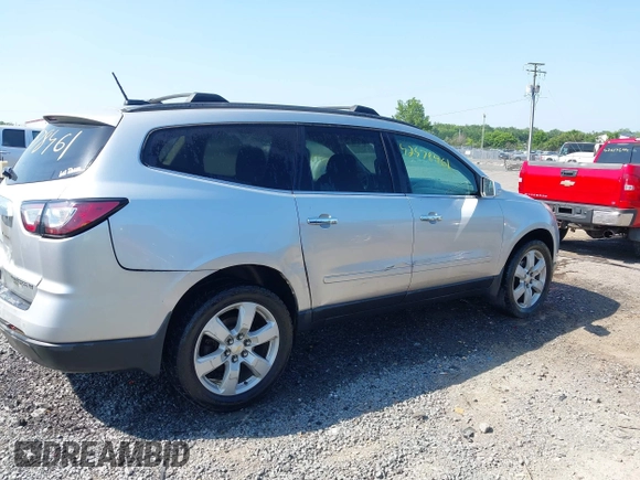 2016 Chevrolet Traverse LT with VIN 1GNKRGKD3GJ275039, listed as a IAAI auction lot 42578461 with 131,843 mi miles and . Bid and sale history available at DreamBid. Image 13.