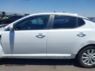 2015 Kia Optima EX z VIN 5XXGN4A72FG421289, wystawiony jako IAAI lot #42692024 z przebiegiem 91 000 mil mil oraz . Historia ofert i sprzedaży dostępna na DreamBid. Obrazek 14.