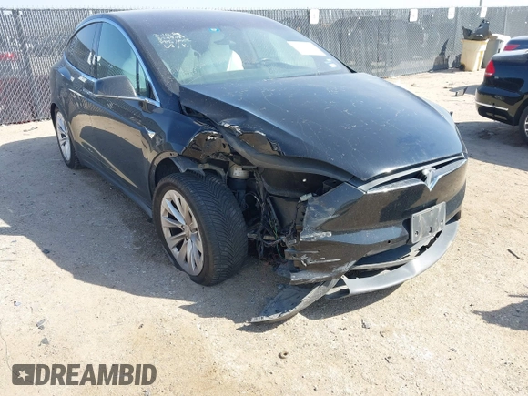 2019 Tesla Model X 75D with VIN 5YJXCBE22KF184504, listed as a IAAI auction lot 41802023 with 137,094 mi miles. Bid and sale history available at carsss.com. Image 6.