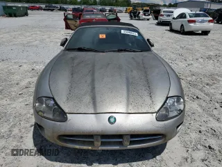 1999 Jaguar XK z VIN SAJGX2049XC034022, wystawiony jako Copart lot #55690025 z przebiegiem Nie podano mil oraz Tytuł czysty. Historia ofert i sprzedaży dostępna na DreamBid. Obrazek 5.