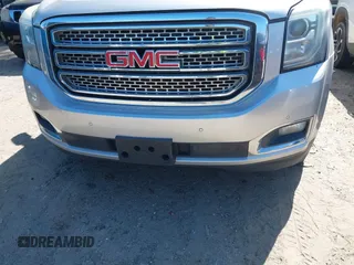 2015 GMC Yukon XL SLT with VIN 1GKS1HKC8FR221608, listed as a IAAI auction lot 42044318 with 215,757 mi miles. Bid and sale history available at carsss.com. Image 6.