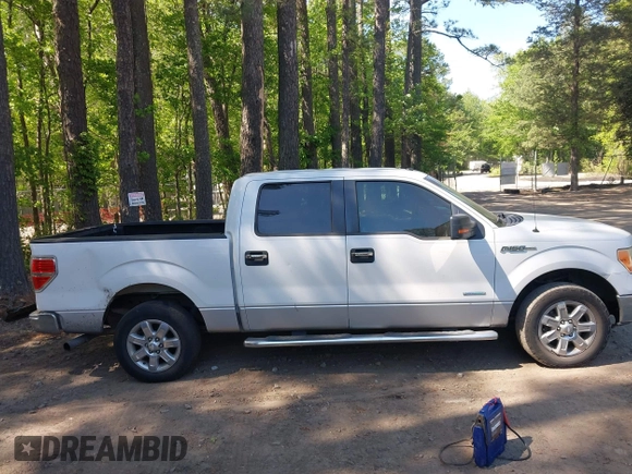 2013 Ford F-150 XL with VIN 1FTFW1CT8DFA12243, listed as a IAAI auction lot 42133425 with 240,282 mi miles and . Bid and sale history available at DreamBid. Image 13.