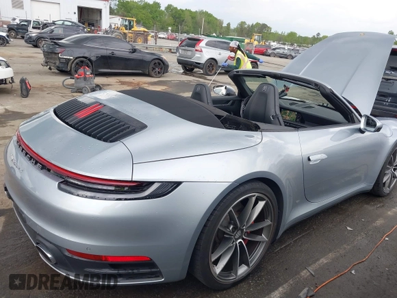 2020 Porsche 911 Carrera S with VIN WP0CB2A97LS262106, listed as a IAAI auction lot 42011151 with 63,444 mi miles. Bid and sale history available at carsss.com. Image 19.