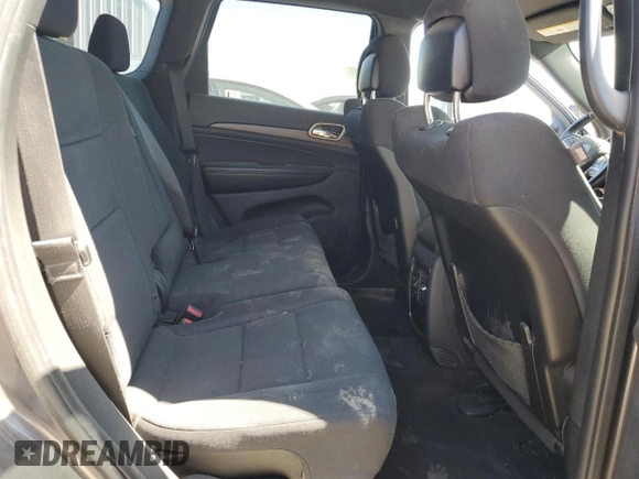2016 Jeep Grand Cherokee Laredo with VIN 1C4RJFAG2GC328841, listed as a Copart auction lot 63553435 with 100,472 mi miles and Salvage title. Bid and sale history available at DreamBid. Image 11.