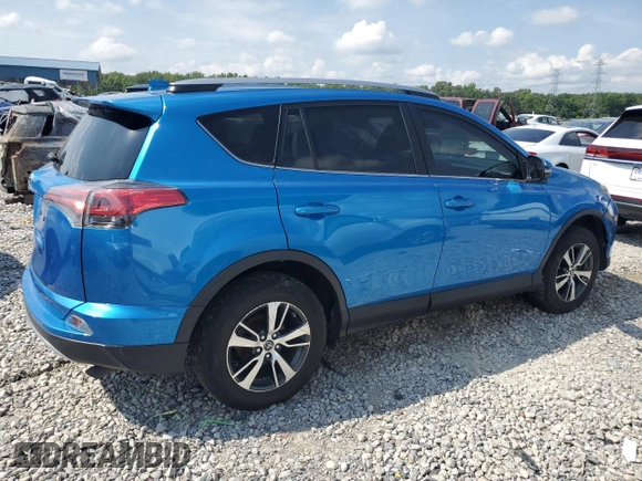 2017 Toyota RAV4 XLE with VIN JTMWFREV6HJ714920, listed as a Copart auction lot 63988704 with 61,221 mi miles and Salvage Title. Bid and sale history available at DreamBid. Image 3.