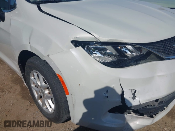 2017 Chrysler Pacifica Touring with VIN 2C4RC1DG6HR633826, listed as a IAAI auction lot 42170041 with 143,481 mi miles and . Bid and sale history available at DreamBid. Image 6.