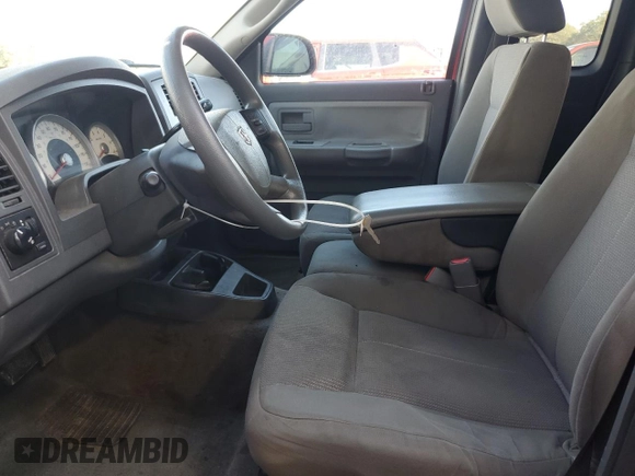 2006 Dodge Dakota SLT z VIN 1D7HE42N76S501233, wystawiony jako Copart lot #80200934 z przebiegiem 281 599 mil mil oraz Szkoda całkowita • Salvage title. Historia ofert i sprzedaży dostępna na DreamBid. Obrazek 7.