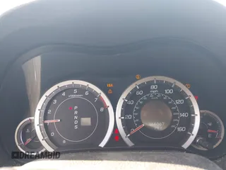 2010 Acura TSX z VIN JH4CU2F62AC034304, wystawiony jako IAAI lot #42129760 z przebiegiem 166 067 mil mil oraz . Historia ofert i sprzedaży dostępna na DreamBid. Obrazek 7.