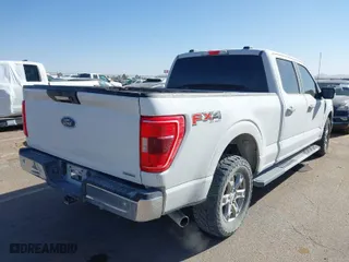 2021 Ford F-150 XL with VIN 1FTFW1E86MFC72651, listed as a IAAI auction lot 41840341 with 100,645 mi miles. Bid and sale history available at carsss.com. Image 4.