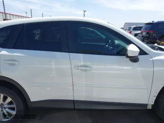 2014 Mazda CX-5 Touring with VIN JM3KE2CY2E0426164, listed as a IAAI auction lot 41812932 with 186,015 mi miles. Bid and sale history available at carsss.com. Image 14.