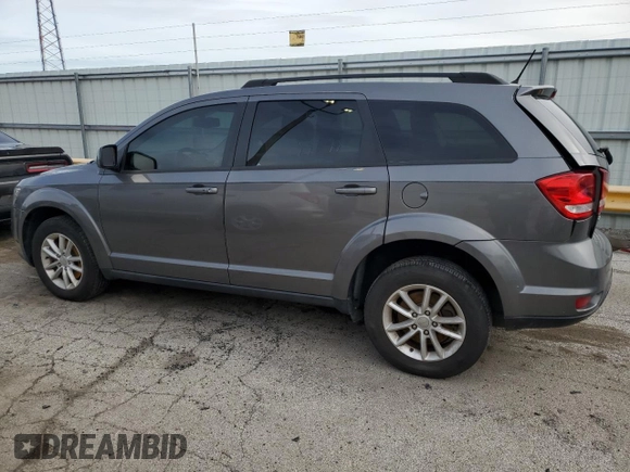 2013 Dodge Journey SXT with VIN 3C4PDCBG5DT695888, listed as a Copart auction lot 50302485 with 126,720 mi miles and Salvage Title. Bid and sale history available at DreamBid. Image 2.