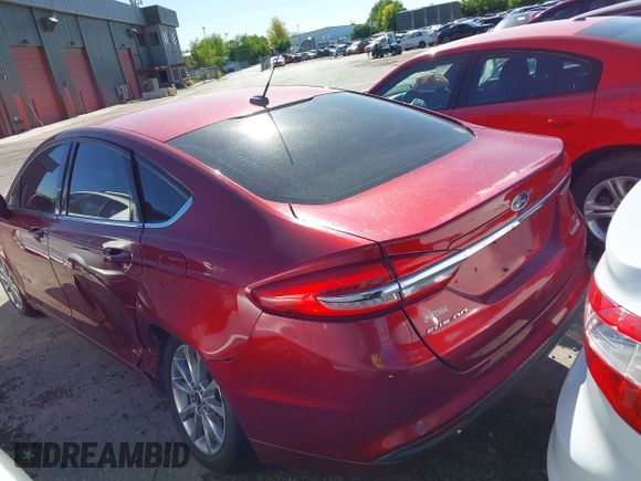 2017 Ford Fusion Hybrid SE with VIN 3FA6P0LU7HR317604, listed as a IAAI auction lot 42713039 with 302,322 mi miles and . Bid and sale history available at DreamBid. Image 3.