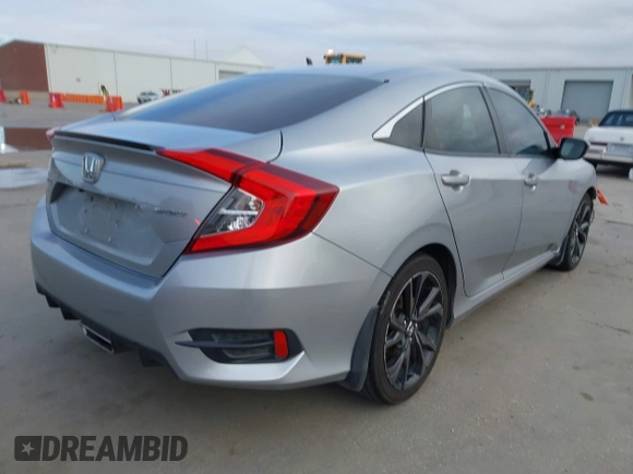 2019 Honda Civic Sport with VIN 19XFC2F8XKE015898, listed as a IAAI auction lot 41431062 with 108,071 mi miles and . Bid and sale history available at DreamBid. Image 4.