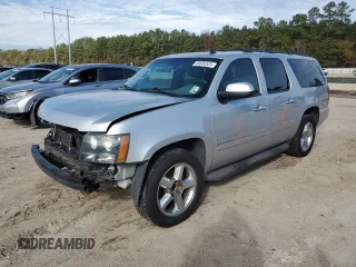 2014 Chevrolet Suburban LTZ with VIN 1GNSCKE02ER141764, listed as a Copart auction lot 85005524 with 234,019 mi miles and Salvage title. Bid and sale history available at DreamBid. Image 1.