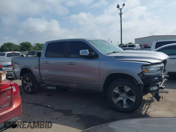 2019 Ram 1500 Laramie with VIN 1C6SRFJT8KN686506, listed as a IAAI auction lot 42499382 with 145,287 mi miles and . Bid and sale history available at DreamBid. Image 14.