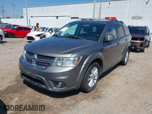 2013 Dodge Journey SXT with VIN 3C4PDDBGXDT650886, listed as a IAAI auction lot 41864331 with 224,579 mi miles and . Bid and sale history available at DreamBid. Image 18.