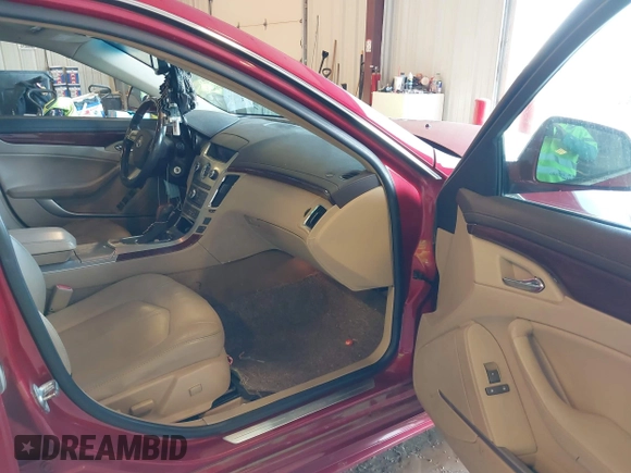 2012 Cadillac CTS Luxury with VIN 1G6DG5E5XC0122855, listed as a IAAI auction lot 41942360 with 246,820 mi miles and . Bid and sale history available at DreamBid. Image 5.