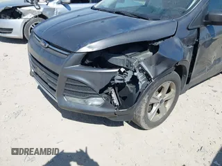 2014 Ford Escape SE with VIN 1FMCU9GX0EUC75145, listed as a IAAI auction lot 42048519 with 186,670 mi miles and . Bid and sale history available at DreamBid. Image 6.
