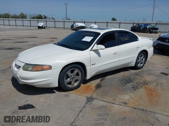 2003 Pontiac Bonneville SLE z VIN 1G2HY52K134202421, wystawiony jako IAAI lot #42136163 z przebiegiem Nie podano mil oraz . Historia ofert i sprzedaży dostępna na DreamBid. Obrazek 2.