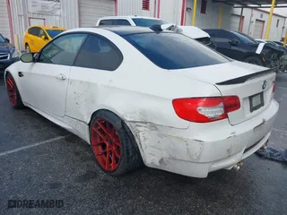 2011 BMW M3 with VIN WBSKG9C5XBE646032, listed as a IAAI auction lot 41778601 with 123,830 mi miles. Bid and sale history available at carsss.com. Image 3.