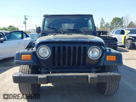 2005 Jeep Wrangler X with VIN 1J4FA39S35P372731, listed as a IAAI auction lot 41875121 with 146,034 mi miles and . Bid and sale history available at DreamBid. Image 12.