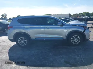 2020 Hyundai Santa Fe SEL with VIN 5NMS3CAD5LH218667, listed as a IAAI auction lot 41025347 with 81,632 mi miles and . Bid and sale history available at DreamBid. Image 13.