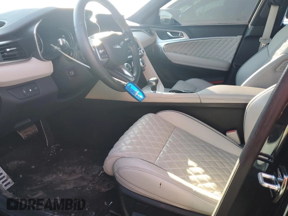 2022 Genesis G70 3.3T z VIN KMTG54TE0NU103581, wystawiony jako Copart lot #46139865 z przebiegiem 43 493 mil mil oraz Szkoda całkowita • Salvage title. Historia ofert i sprzedaży dostępna na DreamBid. Obrazek 7.