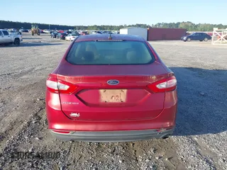 2014 Ford Fusion S with VIN 3FA6P0G75ER146318, listed as a IAAI auction lot 41971648 with 249,694 mi miles. Bid and sale history available at carsss.com. Image 16.