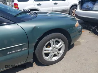 1997 Chrysler Sebring JXi with VIN 3C3EL55H9VT593610, listed as a IAAI auction lot 42130218 with 171,578 mi miles and . Bid and sale history available at DreamBid. Image 12.