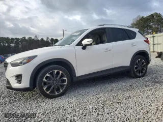 2016 Mazda CX-5 Grand Touring with VIN JM3KE2DY6G0786927, listed as a Copart auction lot 51668495 with 132,736 mi miles and Salvage Title. Bid and sale history available at carsss.com. Image 1.