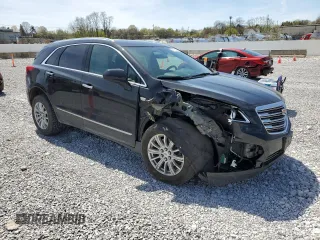 2017 Cadillac XT5 FWD with VIN 1GYKNARS2HZ131243, listed as a Copart auction lot 54189395 with 134,324 mi miles and Salvage Title. Bid and sale history available at DreamBid. Image 4.