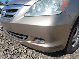 2006 Honda Odyssey EX-L with VIN 5FNRL38666B410188, listed as a IAAI auction lot 42004957 with 156,584 mi miles. Bid and sale history available at carsss.com. Image 13.