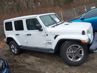 2021 Jeep Wrangler Unlimited Sahara with VIN 1C4HJXEG6MW751752, listed as a IAAI auction lot 41104960 with 47,460 mi miles and . Bid and sale history available at DreamBid. Image 14.