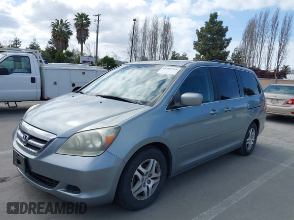 2007 Honda Odyssey EX-L with VIN 5FNRL38727B017587, listed as a IAAI auction lot 41900739 with 216,909 mi miles and . Bid and sale history available at carsss.com. Image 6.