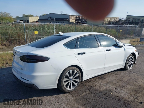 2020 Ford Fusion SE z VIN 3FA6P0T93LR247572, wystawiony jako IAAI lot #40481880 z przebiegiem 59 141 mil mil oraz . Historia ofert i sprzedaży dostępna na DreamBid. Obrazek 4.