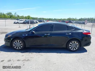 2017 Kia Optima EX with VIN 5XXGU4L35HG142807, listed as a IAAI auction lot 41856251 with 104,634 mi miles. Bid and sale history available at carsss.com. Image 14.