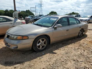 2002 Pontiac Bonneville SE z VIN 1G2HX54K024122476, wystawiony jako Copart lot #65397005 z przebiegiem 111 528 mil mil oraz Szkoda całkowita • Salvage title. Historia ofert i sprzedaży dostępna na DreamBid. Obrazek 1.