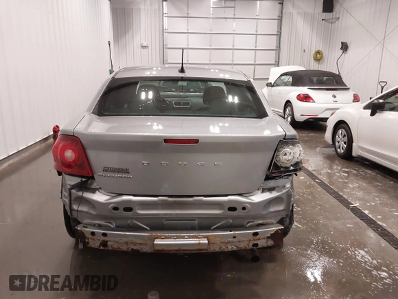 2014 Dodge Avenger SE with VIN 1C3CDZAB4EN148429, listed as a IAAI auction lot 41687320 with 149,084 mi miles and . Bid and sale history available at DreamBid. Image 17.