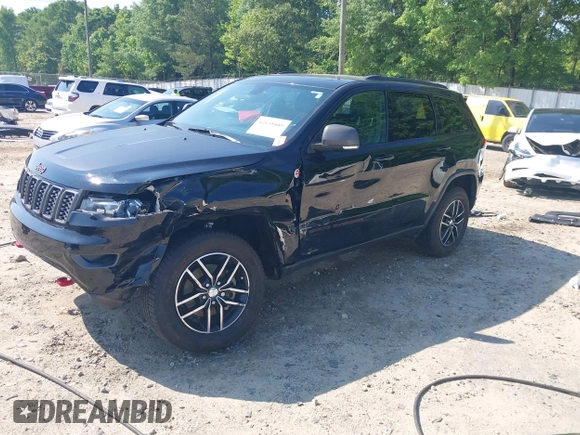 2017 Jeep Grand Cherokee Trailhawk with VIN 1C4RJFLG4HC940652, listed as a IAAI auction lot 42135489 with 102,593 mi miles and . Bid and sale history available at DreamBid. Image 18.