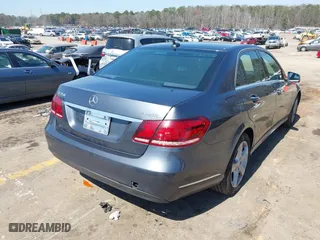 2014 Mercedes-Benz E-Class E 350 Luxury with VIN WDDHF8JB8EA865368, listed as a IAAI auction lot 41790012 with 98,788 mi miles. Bid and sale history available at carsss.com. Image 4.